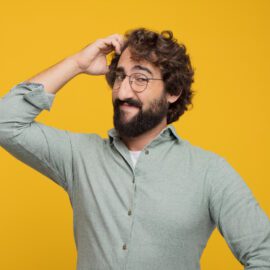 Man Scratching his head in dilemma